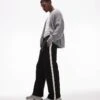 Topman Baggy Leg Jogger With Contrast Side Stripe In Black For Men